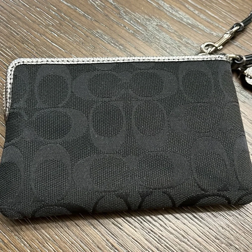 Coach black signature silver metallic leather edge wristlet